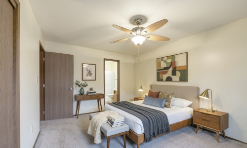 Bedroom with natural lighting and high ceilings